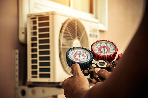 Professional Air Conditioning Service technician working in Fayetteville, GA